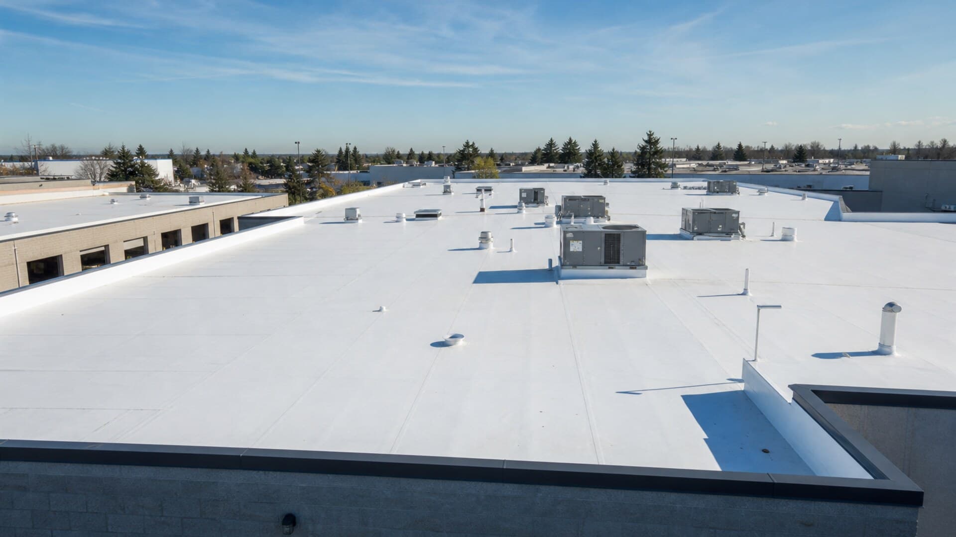 Commercial flat roof installation by Wright Roofing